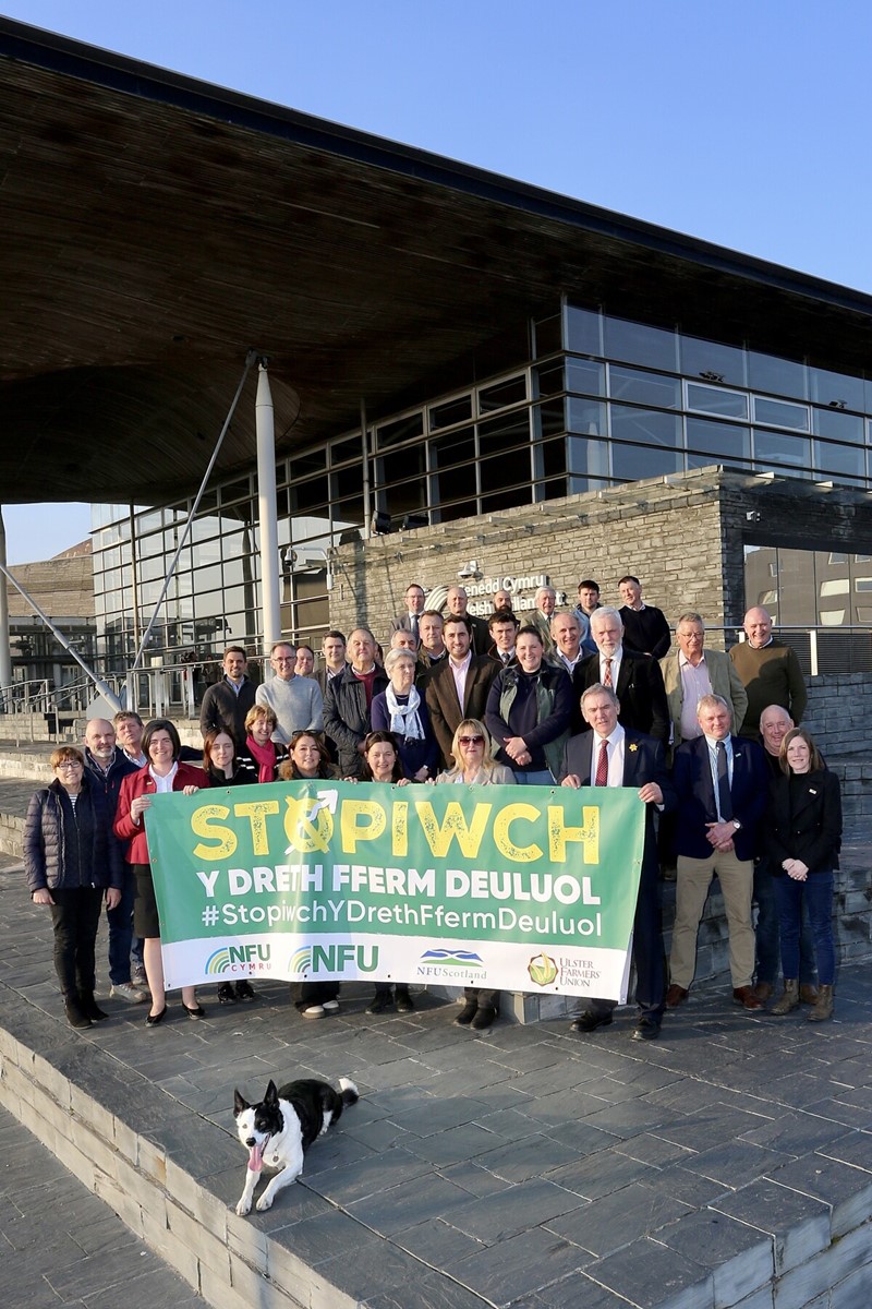 Member of NFU Cymru outside the Senedd before Plaid Cymru's IHT debate 