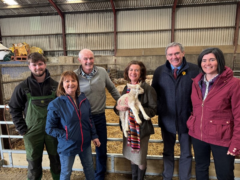 Pictured (L-R) the host family of Daniel, Eryl and Dai Charles Evans; First Minister of Wales, Eluned Morgan MS; NFU Cymru President, Aled Jones; and NFU Cymru Deputy President,  Abi Reader 