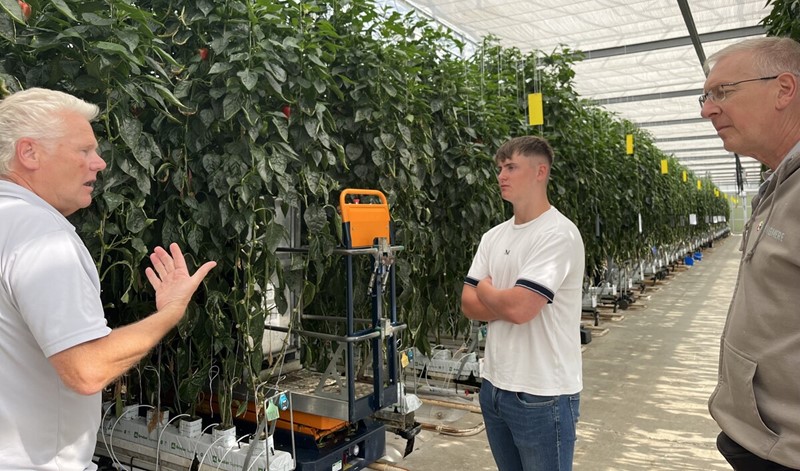 Apprentice Aaron Copeland in a glasshouse