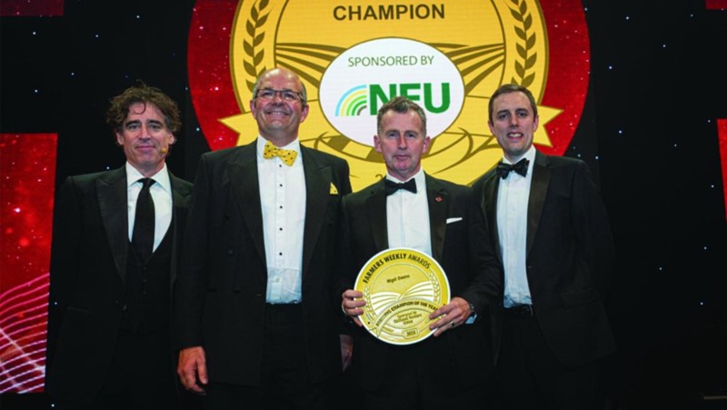 Nigel Owens standing at awards with Tom Bradshaw, Stephen Mangan and Andrew Meredeith