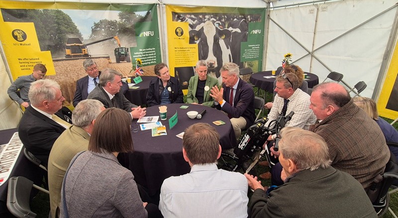 A photo of attendees at NFU's meeting with Defra and Rural Payment Agency officials inside the NFU tent at Westmorland County Show