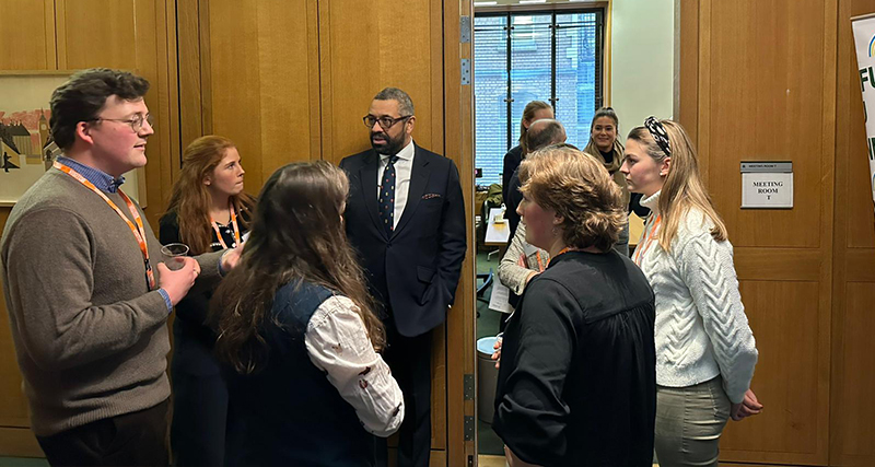 Young farming members talking to James Cleverly MP