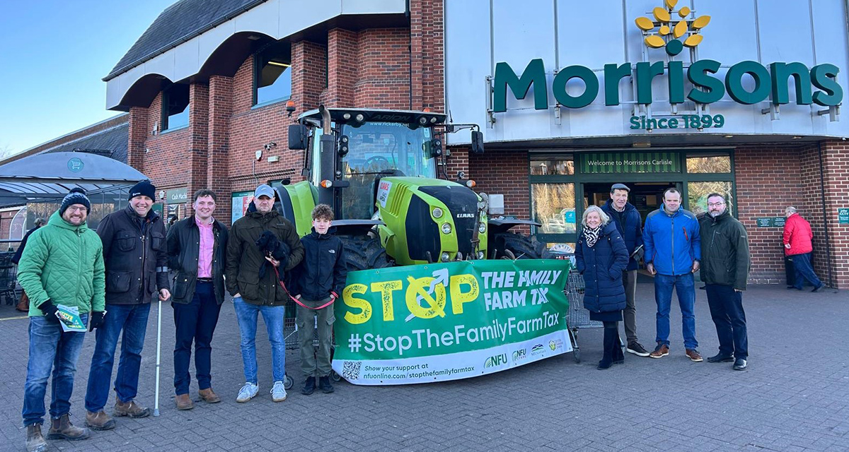 A photo of farmers gathered outside Carlisle Morrisons with a tractor on the Farming Day of Unity