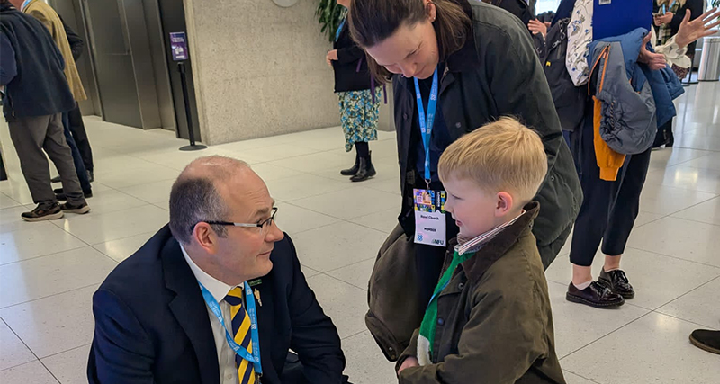 Tom Bradshaw talking to 5-year-old Bertie and his mum Hazel