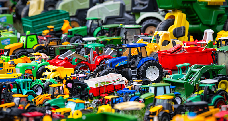 Close-up of pre-loved farm toys