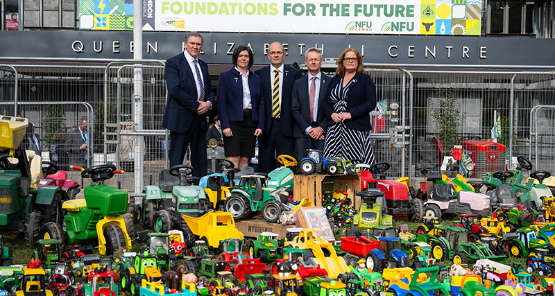 L-R NFU Cymru President Aled Jones and Deputy President Abi Reader and NFU President Tom Bradshaw, NFU Deputy President David Exwood and NFU Vice President Rachel Hallos at the pre-loved farm toy display