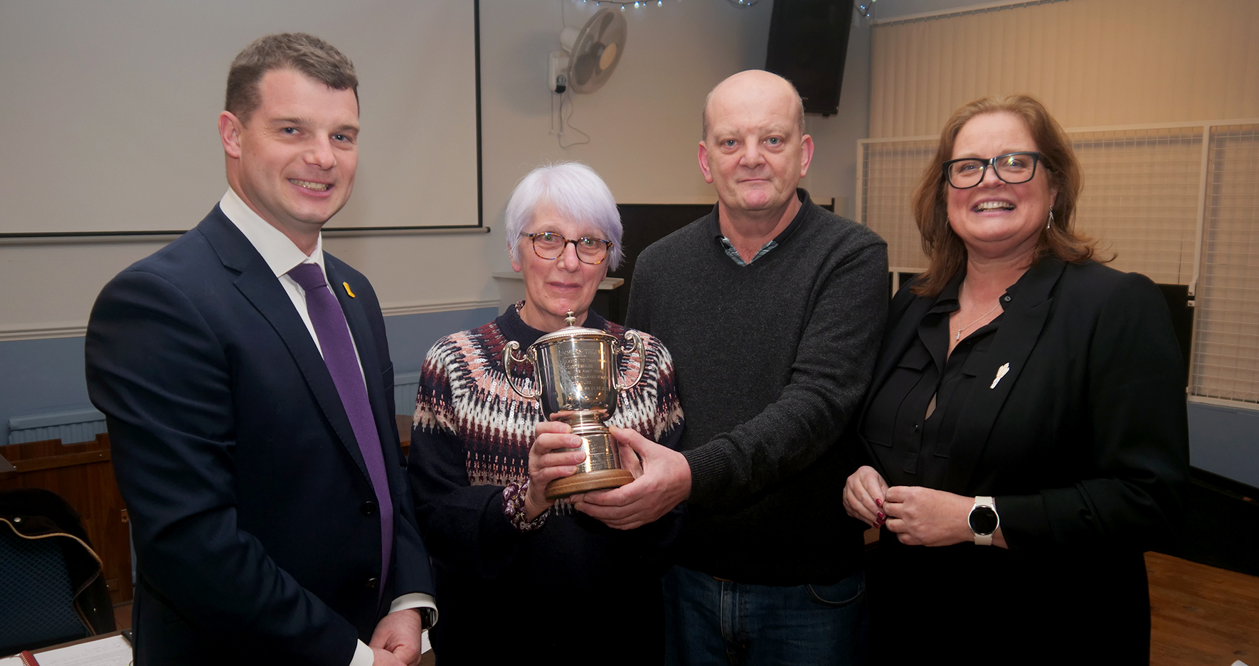 The Summers Trophy is presented to Sue and Terry Cook