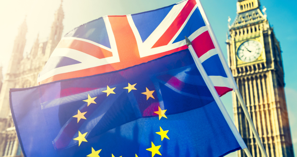 The EU and UK flags pictured infront of Big Ben. 